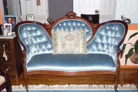 Light blue tufted settee